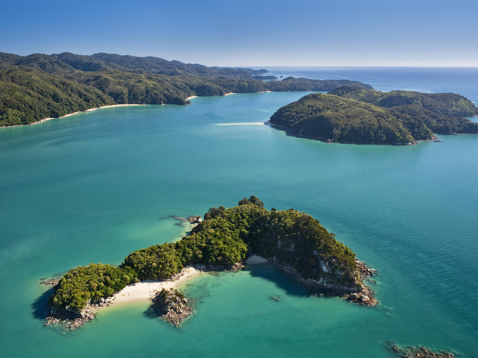 Scenic cruise boat along the Abel Tasman coastline