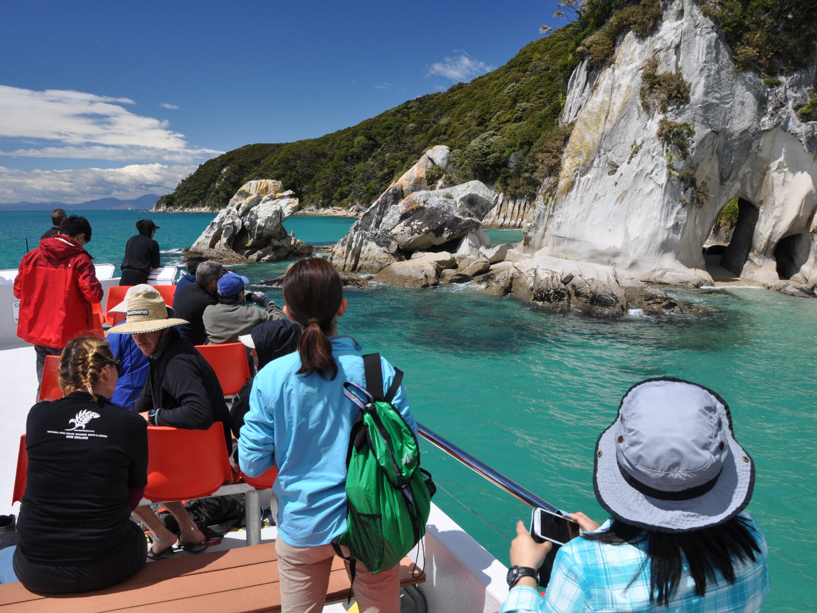 Guests viewing Abel Tasman from the boat
